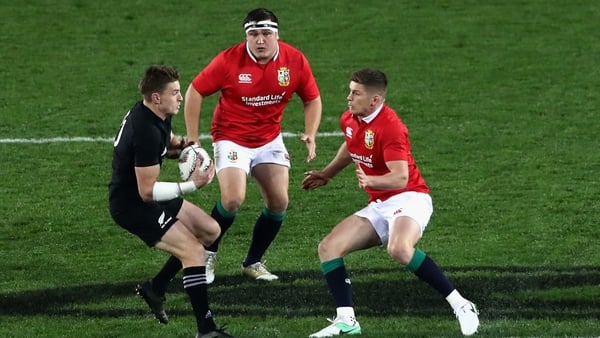 Beauden Barrett (L) and Owen Farrell (R) faced each other on the Lions tour this summer