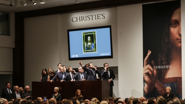 Agents on their phones with their clients during the bidding in New York