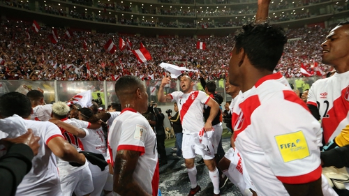 Peru's players celebrate their play-off win