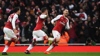 Arsenal sink United in chaotic stoppage-time surge