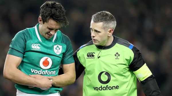 Carbery is helped from the field