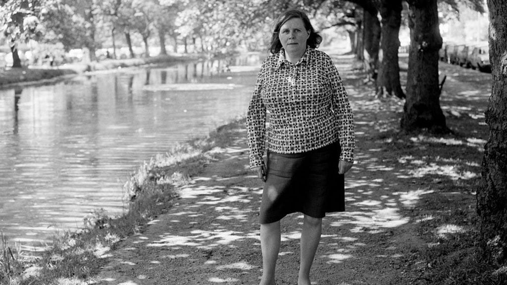 Katherine Kavanagh, the widow of Irish poet Patrick Kavanagh, ca.1978. Standing by the banks of the Grand Canal near Baggot Street Bridge, Dublin.
© RTÉ Stills Library 2067/002