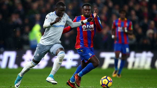 Oumar Niasse (L) in action against Crystal Palace