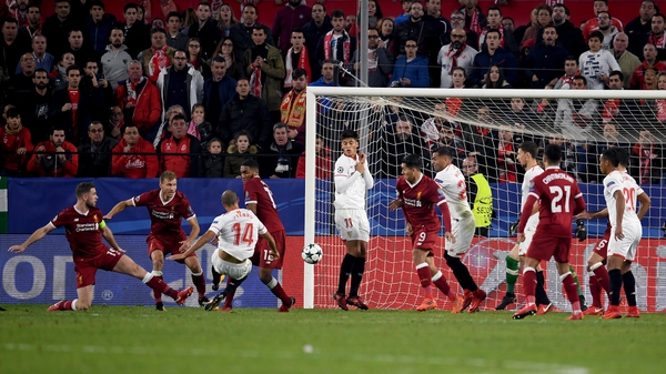 Guido Pizarro stabs home Sevilla's injury-time equaliser against Liverpool in Tuesday's Champions League clash