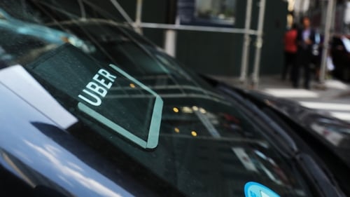Uber's shares rose nearly 4% at midday after the rideshare giant reported a surprise fourth-quarter profit