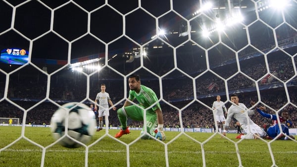 Sergio Romero watches the ball roll into the net
