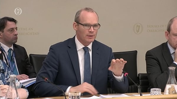 Minister Simon Coveney appearing before an Oireachtas Committee