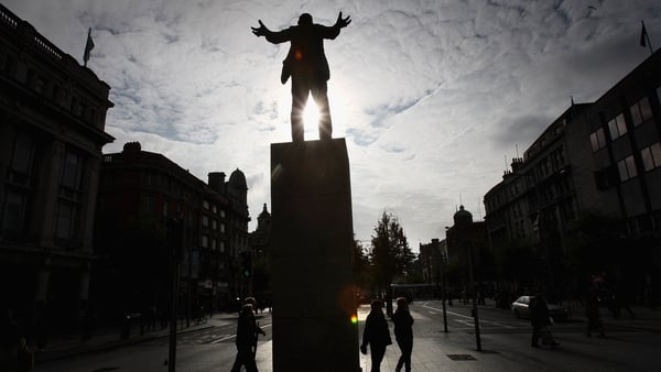 The sun shines through a statue of James Larkin on O'Connell Street in Dublin. Photo: Chris Jackson/Getty Images