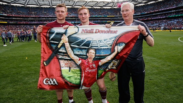 Joe Canning, Conor Whelan and Galway kitman Tex Callaghan pay tribute to Niall Donohue after the All-Ireland final