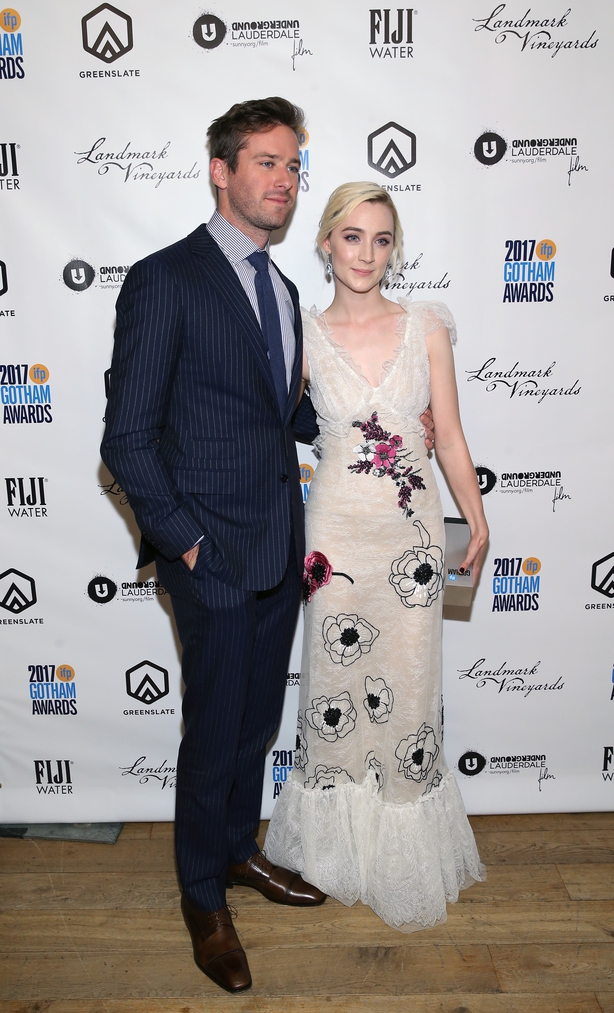 Armie Hammer and Saoirse Ronan pose with her award at the 2017 Gotham Awards