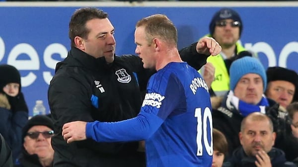 Unsworth greets Rooney after his hat-trick