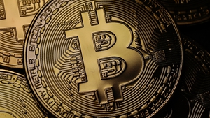 Investors were spooked by fears that regulators might clamp down on Bitcoin, whose value has skyrocketed in the past year