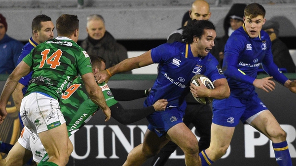 Leinster's James Lowe is tackled by Giorgio Bronzini of Benetton Treviso