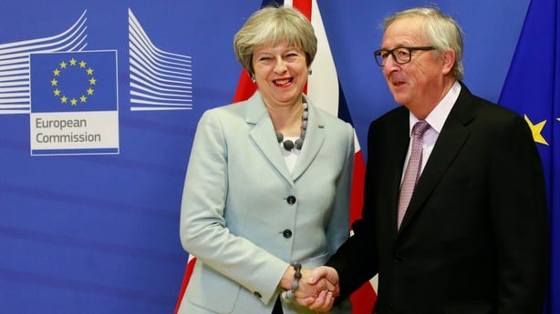 Theresa May and Jean Claude Juncker