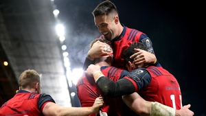 Peter O'Mahony celebrates scoring Munster's third try with Conor Murray and Alex Wootton