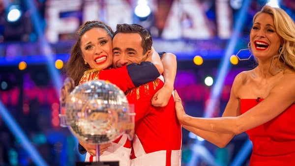 They are the Champions - The shocked Joe McFadden and Katya Jones are congratulated by Strictly host Tess Daly as their win is announced on Saturday night