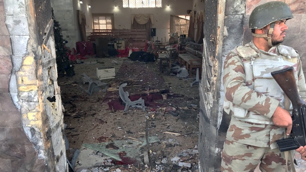 Police at the church exchanged fire with the attackers before they could enter the main sanctuary