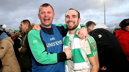 Moorefield's Kevin Murnaghan (R) celebrates after the game with manager Ross Galvin