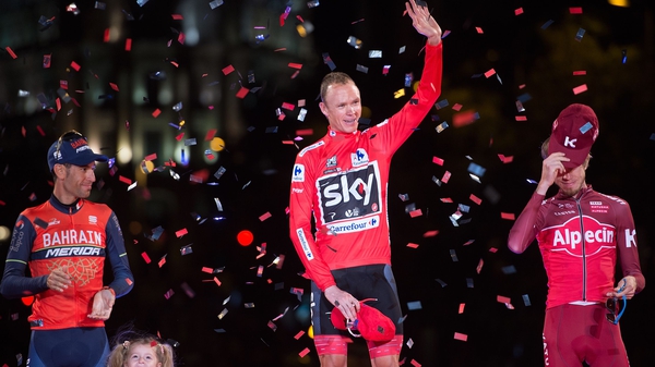 Britain's Chris Froome (c) of Team Sky celebrates on the podium with second placed Italy's Vincenzo Nibali (l)