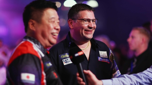 Paul Lim (L) with Gary Anderson