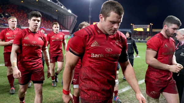 CJ Stander and his Munster team-mates leave the field dejected