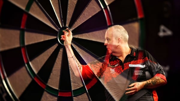 Phil Taylor in action against Gary Anderson