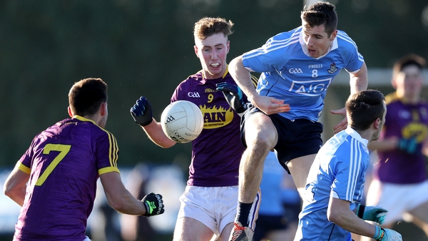 Wexford's Nick Doyle and Dublin's Emmet O'Conghaile vie for possession
