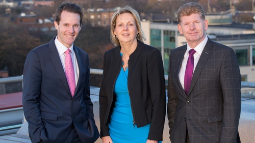 EY's Shane MacSweeney, DKM's Annette Hughes and Mike McKerr, Country Managing Partner at EY Ireland