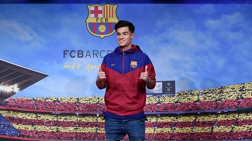 The £142 million man: Philippe Coutinho completes his move from Liverpool to Barcelona