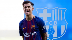 Philippe Coutinho posing in his new Barcelona shirt