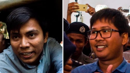 Kyaw Soe Oo (L) and Wa Lone face up to 14 years in prison if convicted