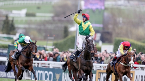 Robbie Power steered Sizing John up the Cheltenham hill to win the blue riband