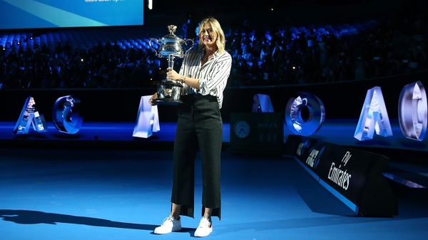 Sharapova with the Daphne Akhurst Memorial Cup at the Aussie Open draw