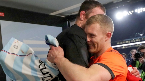 Friends Donnacha Ryan and Keith Earls embrace after the game