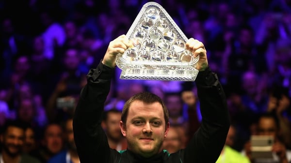 Mark Allen lifts the Masters trophy