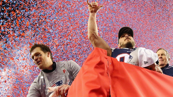 Tom Brady (l) celebrates another AFC title