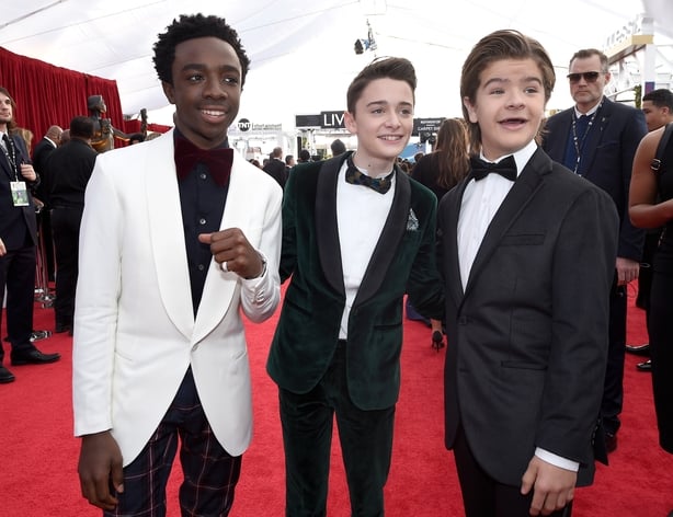 Actors Caleb McLaughlin (L), Noah Schnapp; and Gaten Matarazzo attend the 24th Annual Screen Actors Guild Awards at The Shrine Auditorium on January 21, 2018 in Los Angeles, California