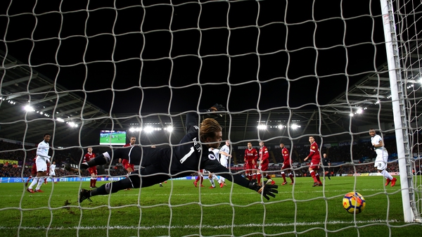 Alfie Mawson gives Swansea the lead at home to Liverpool in the Premier League clash at the Liberty Stadium