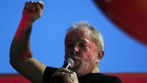 Former President Luiz Inacio Lula da Silva addresses supporters after his corruption conviction was upheld