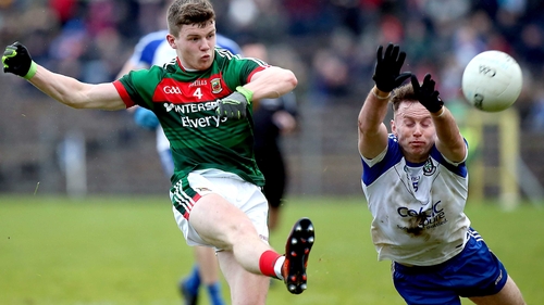 Monaghan's Fintan Kelly with Mayo's Eoin O'Donoghue
