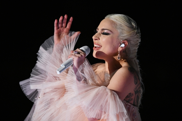 Gaga teamed the white gown with embellished angel wings