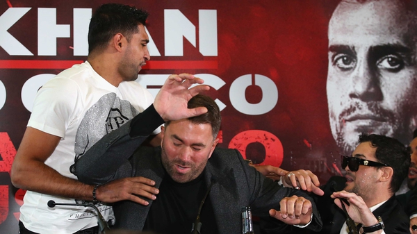 Amir Khan threw water as his opponent during their press conference
