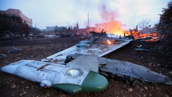 Smoke billowing from the site of a downed Sukhoi-25 fighter jet in Idlib