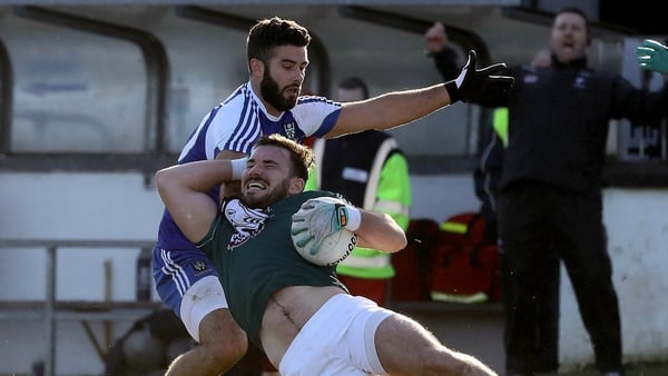 Kildare's Fergal Conway is fouled by Neil McAdam of Monaghan