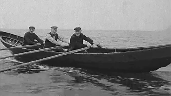 Muiris, Seán and Tomás Ó Dálaigh in their naomhóg (1973)