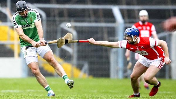 David Collins of Liam Mellows is tackled by Cuala's Sean Treacy