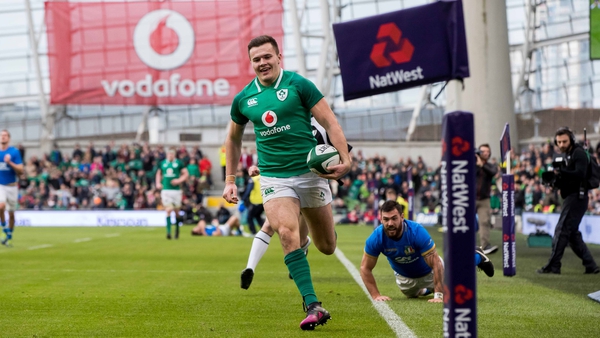 Jacob Stockdale runs in one of eight Irish tries against Italy
