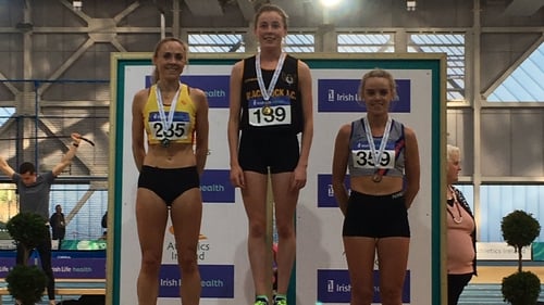 Sarah Healy on the podium with Kerry O'Flaherty (L) and Meghan Ryan (R)