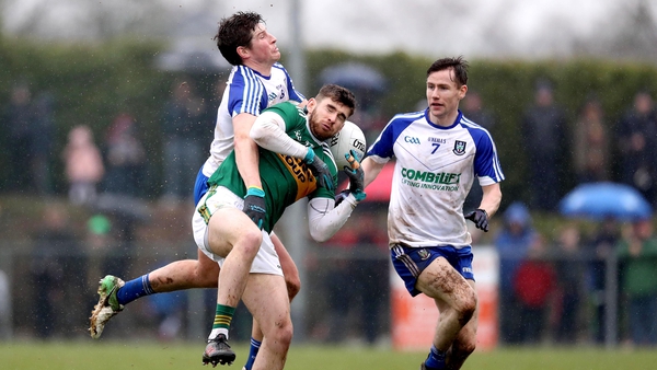Kerry's Eanna O'Conchuir with Darren Hughes of Monaghan