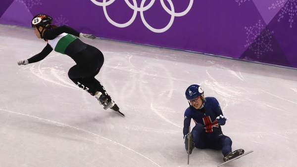 Elise Christie of Great Britain crashes during the Ladies Short Track Speed Skating 1000m Heats